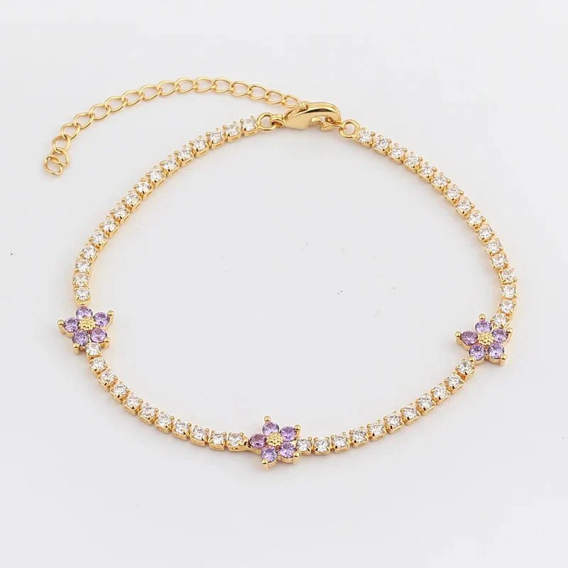 Brehn | Zarte diamantene Blumenarmbänder und Ohrringe
