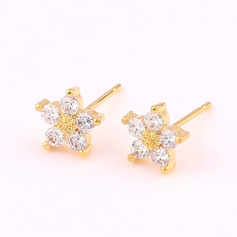 Brehn | Zarte diamantene Blumenarmbänder und Ohrringe