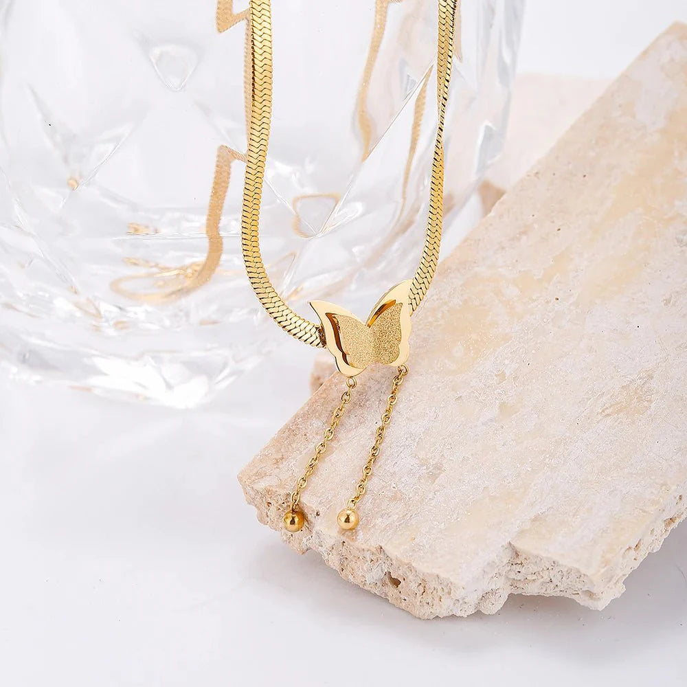 Brehn | Zarte Fischgräten-Butterfly-Ohrhängern-Collier
