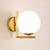Moderne runde Wandlampe mit Glasglobus – Elegante Wandmontage für Schlafzimmer und Wohnzimmer | Brehn