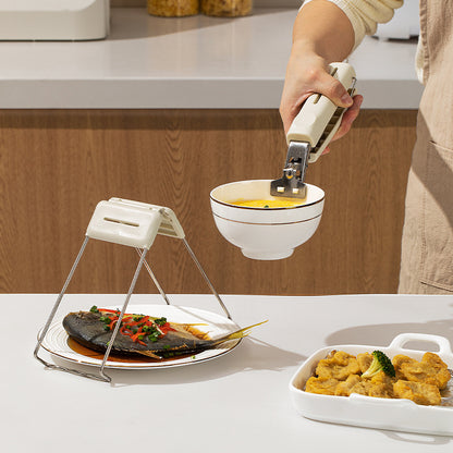 Wärmeschutz-Zange für Schüsseln und Teller