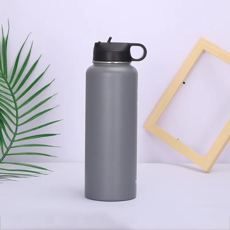 Isolierte Edelstahl-Trinkflasche mit Tragegriff