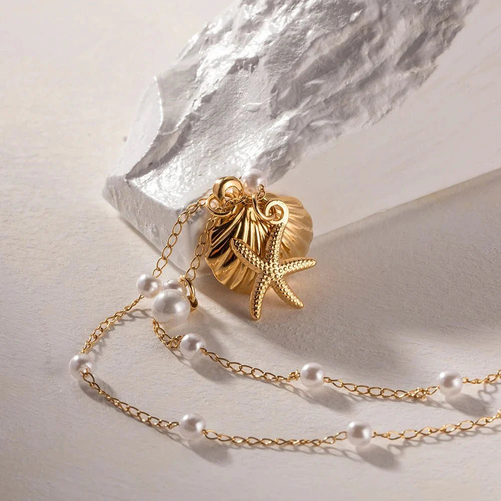 Brehn | Elegante zarte Abstand Perlen Muschelkette