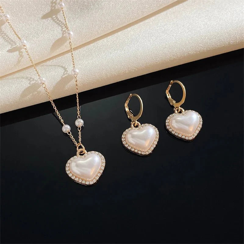 Brehn | Elegantes Perlenherz-Halsketten- und Ohrringe-Set