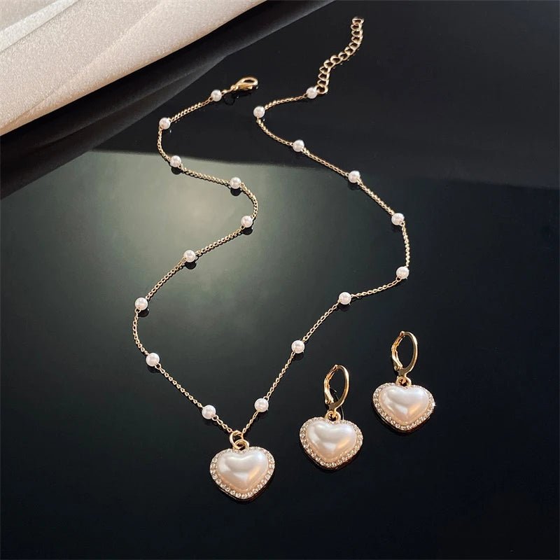 Brehn | Elegantes Perlenherz-Halsketten- und Ohrringe-Set