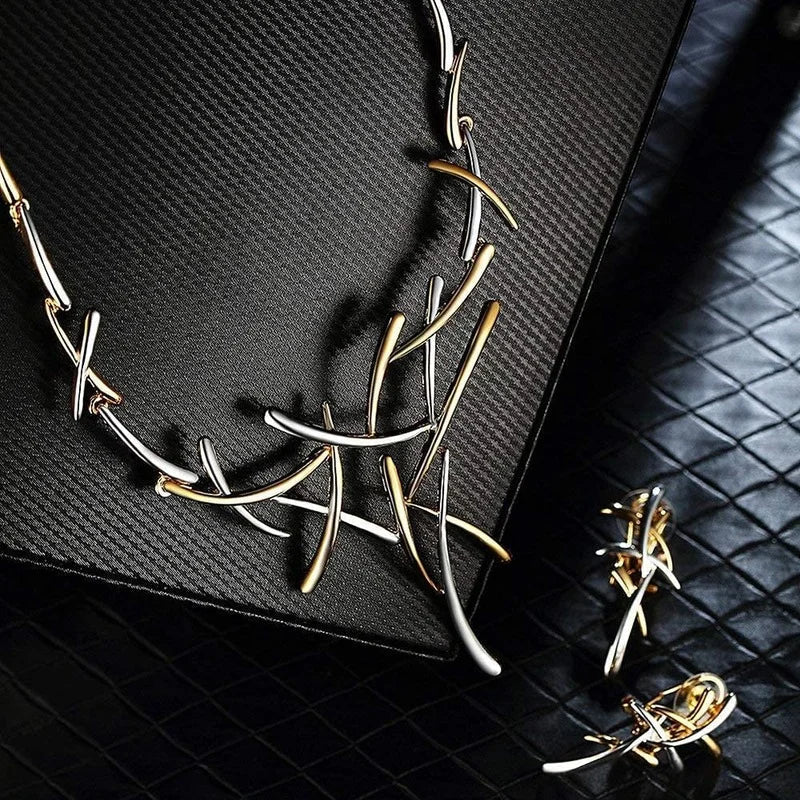 Brehn | Elegantes zweifarbiges Ast-Kreuz Halsketten- und Ohrring-Set