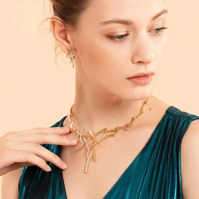Brehn | Elegantes zweifarbiges Ast-Kreuz Halsketten- und Ohrring-Set