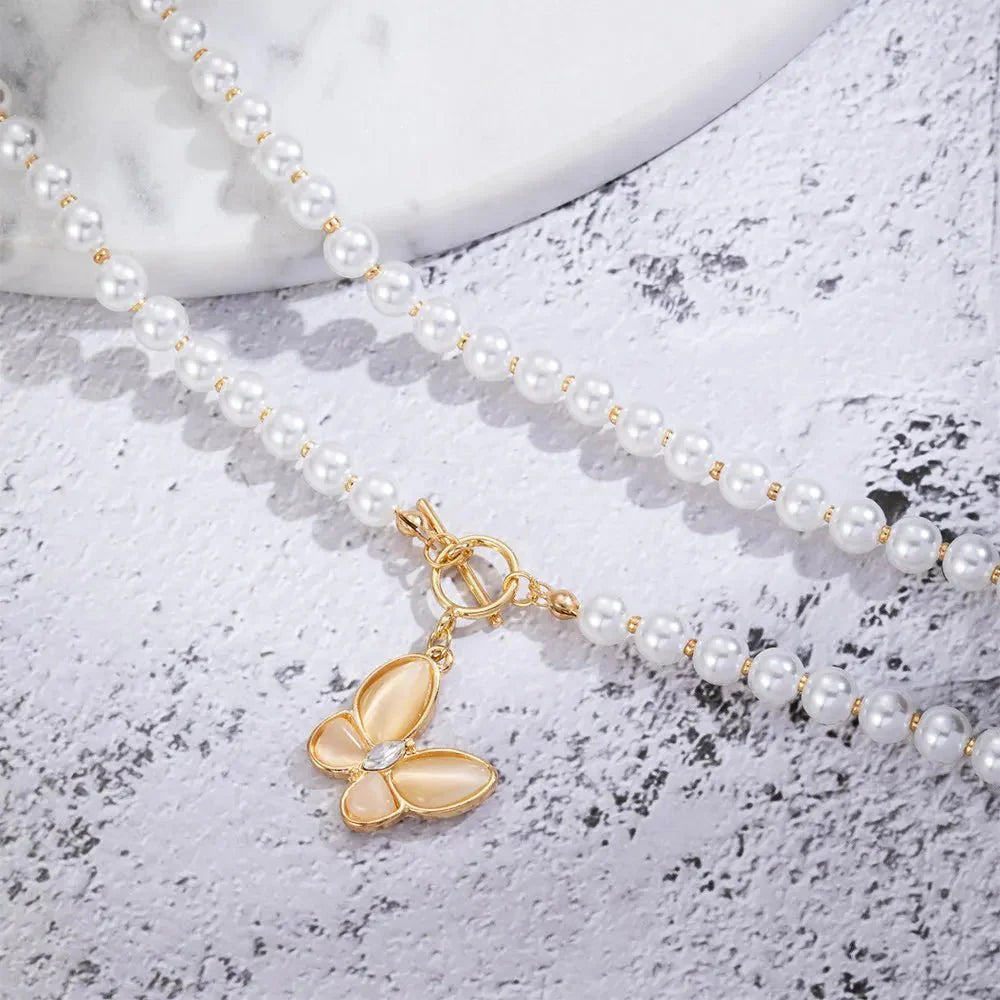 Brehn | Gold Crystal Butterfly Clasp Choker Necklace