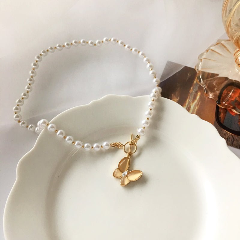 Brehn | Gold Crystal Butterfly Clasp Choker Necklace