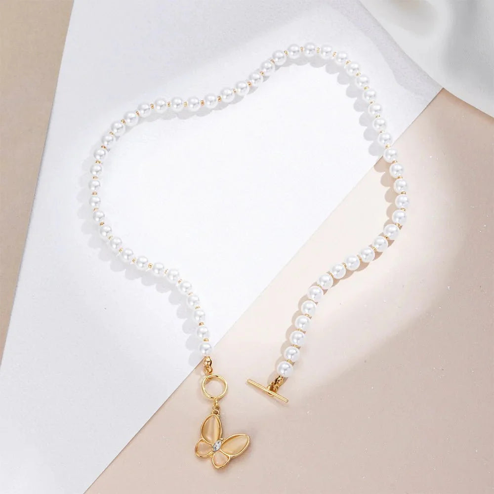 Brehn | Gold Crystal Butterfly Clasp Choker Necklace