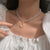 Brehn | Gold Crystal Butterfly Clasp Choker Necklace