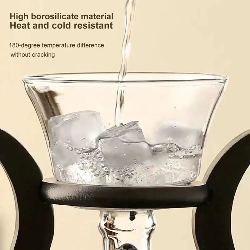 Hitzebeständiges Glas-Teeset mit einem magnetischen, rotierenden Wasserdeckel | Brehn
