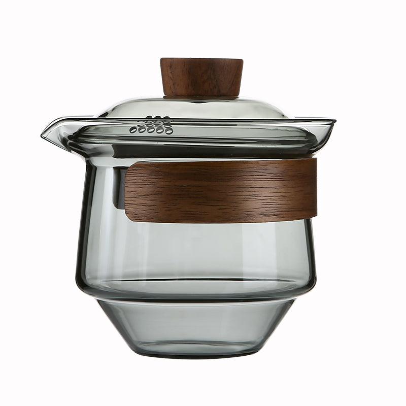 Elegante hitzebeständige Glastasse mit Walnussdeckel für Teeliebhaber