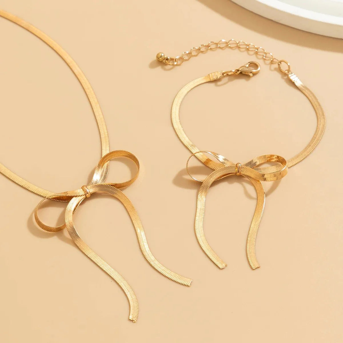 Brehn | Fischgrätenketten Schleifen Halskette und Armband Set