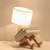 NordicLight – Skandinavische Tischlampe mit integriertem Bücherregal | Brehn