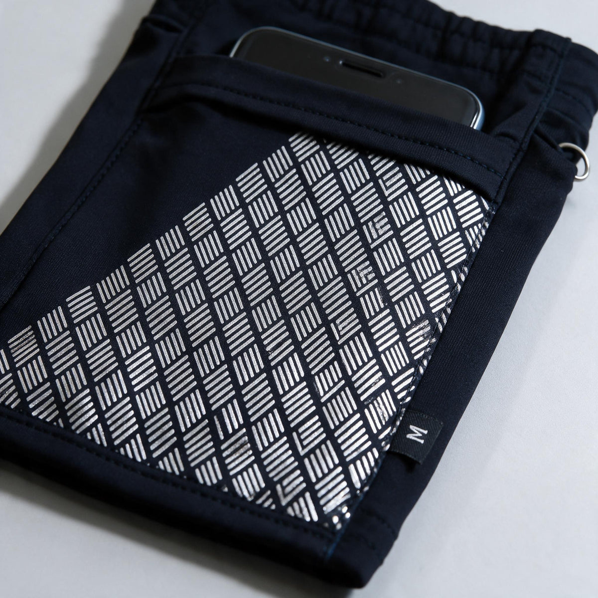 Handy Sportarmband Hülle – reflektierendes Muster im Detail