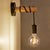 Schwarze industrielle Wand-Nachttischlampe mit Holzsockel | Brehn