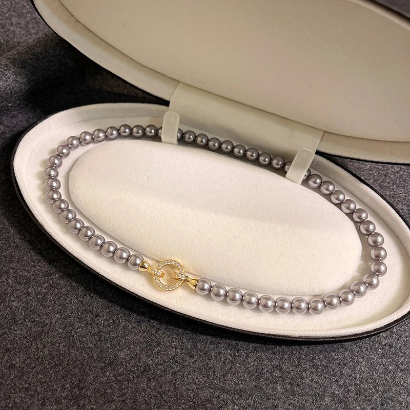 Brehn | Perlen-Diamant-betont Kreis Anhängerarmband und Halskette
