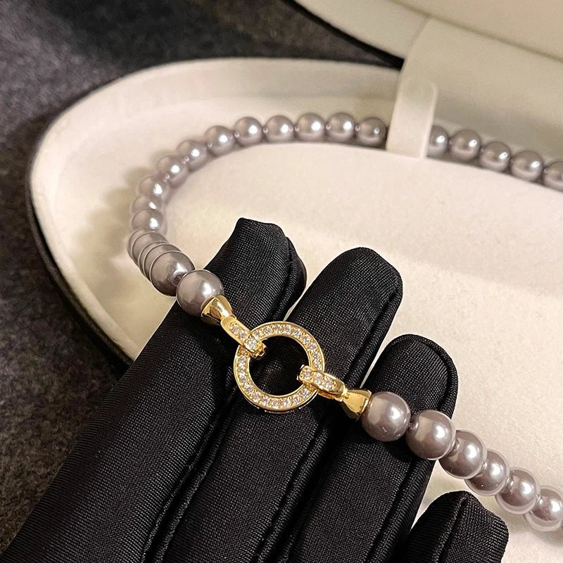 Brehn | Perlen-Diamant-betont Kreis Anhängerarmband und Halskette