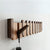 Brehn Melodia | Wandgarderobe im Klaviertasten-Design | Massivholz-Konstruktion aus Walnuss & Buche | Magnetisches Klapp-System | Platzsparende Flurgarderobe