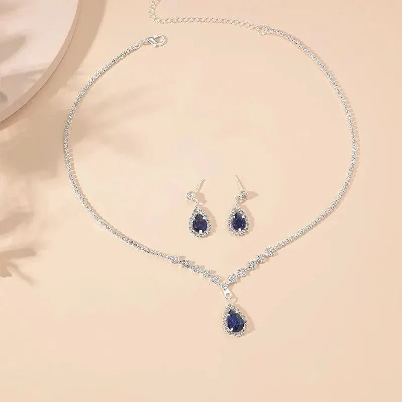 Brehn | Schimmernde blaue Tropfen-Diamant-Halskette und Ohrringe Set