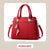 Elegante Damenhandtasche mit Quastenanhänger